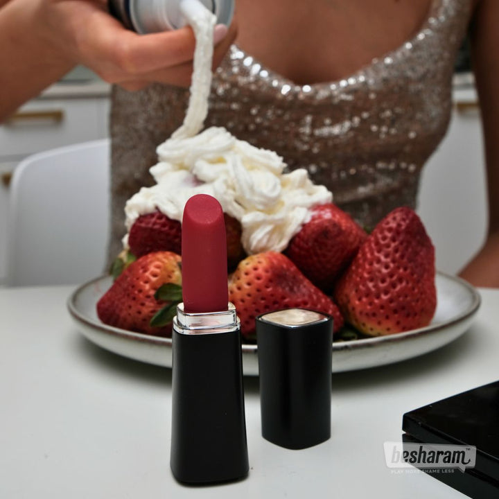Lipstick Vibe 2.0 styled on a table with strawberries and whipped cream